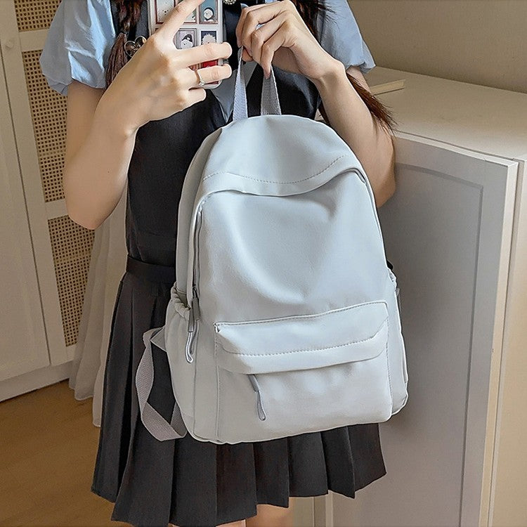 Casual Backpack with Flexible Side Pockets and Organized Compartments