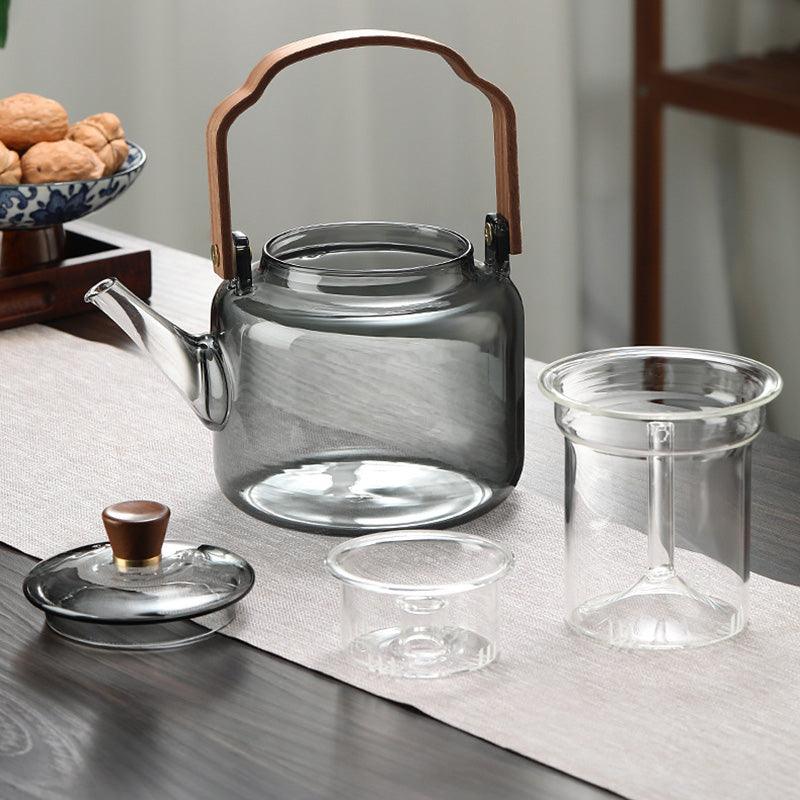 Glass Teapot with Wooden Handle – Elegant Design for Tea Drinking