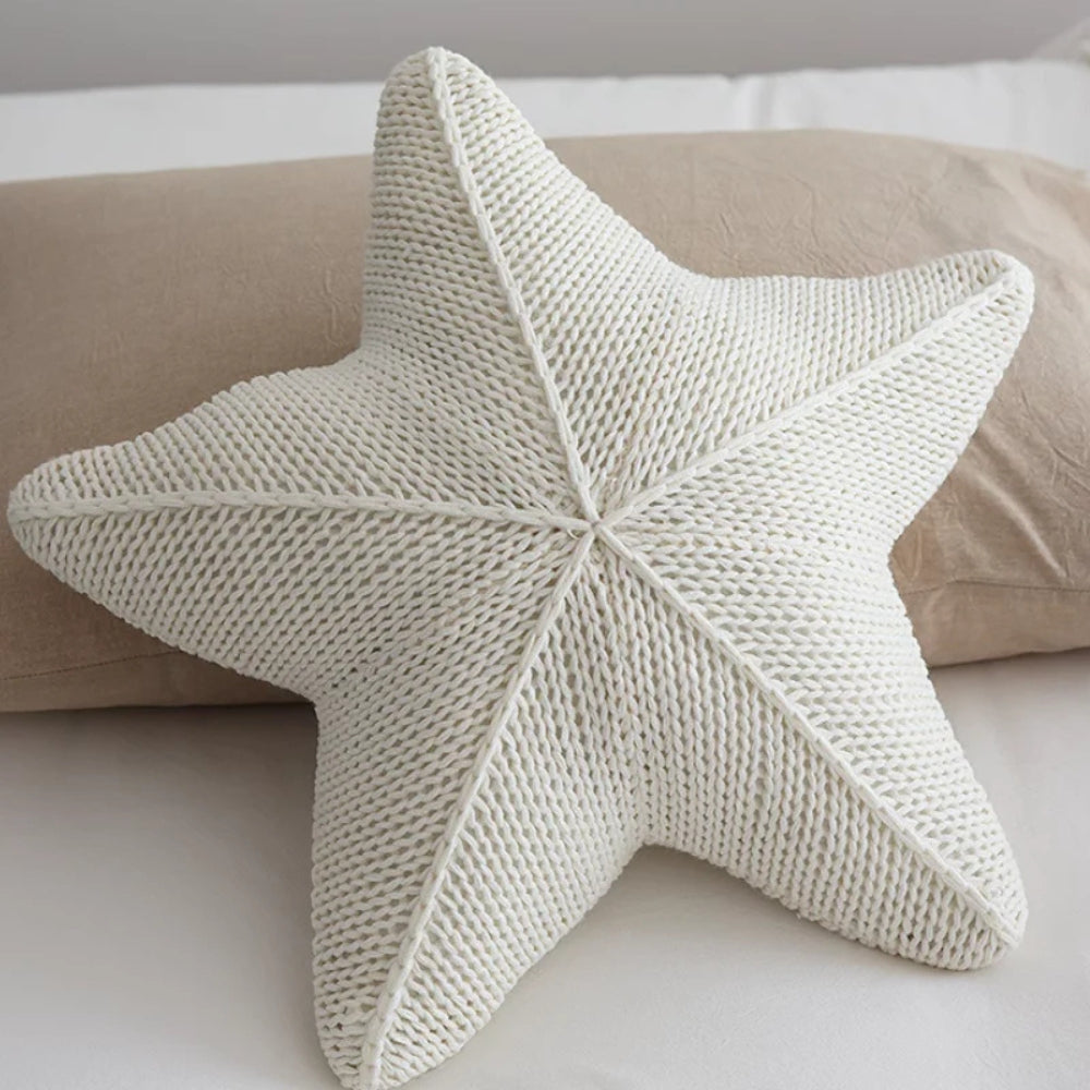 Hand-knitted starfish cushion