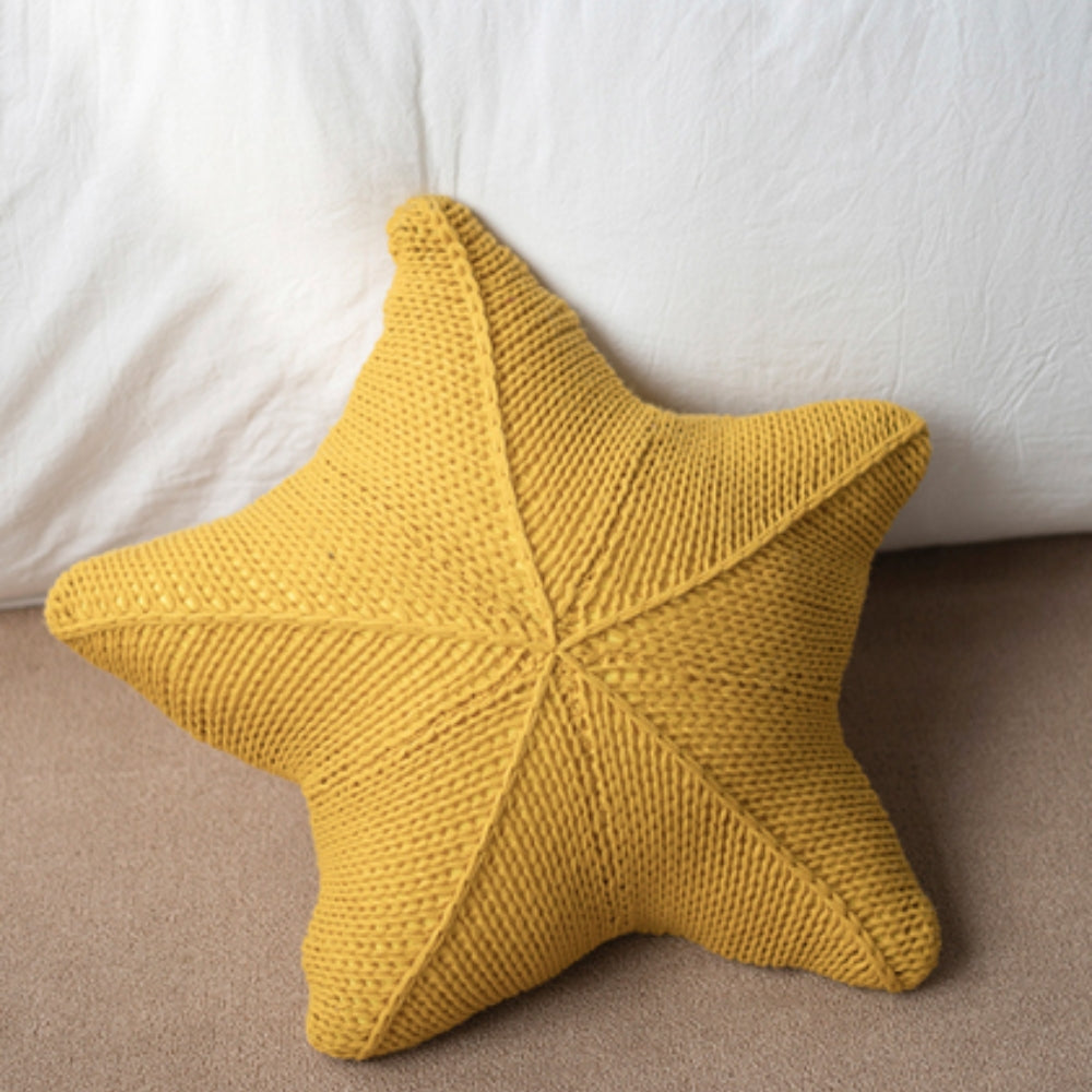Hand-knitted starfish cushion