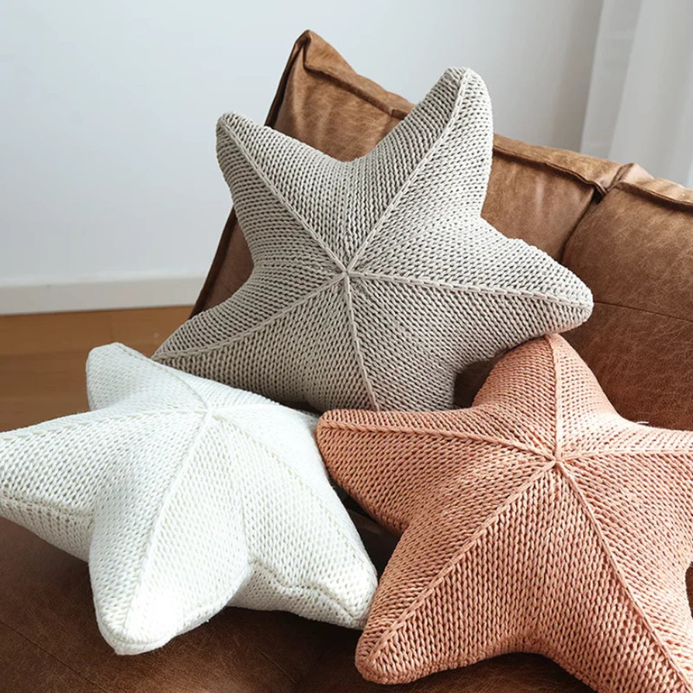 Hand-knitted starfish cushion