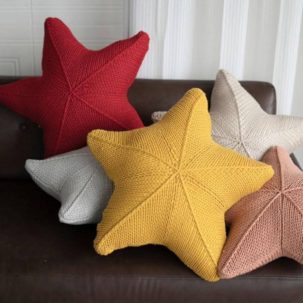 Hand-knitted starfish cushion