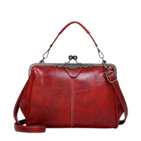 Leather Handbag with Kiss Lock Closure and Clip Handle