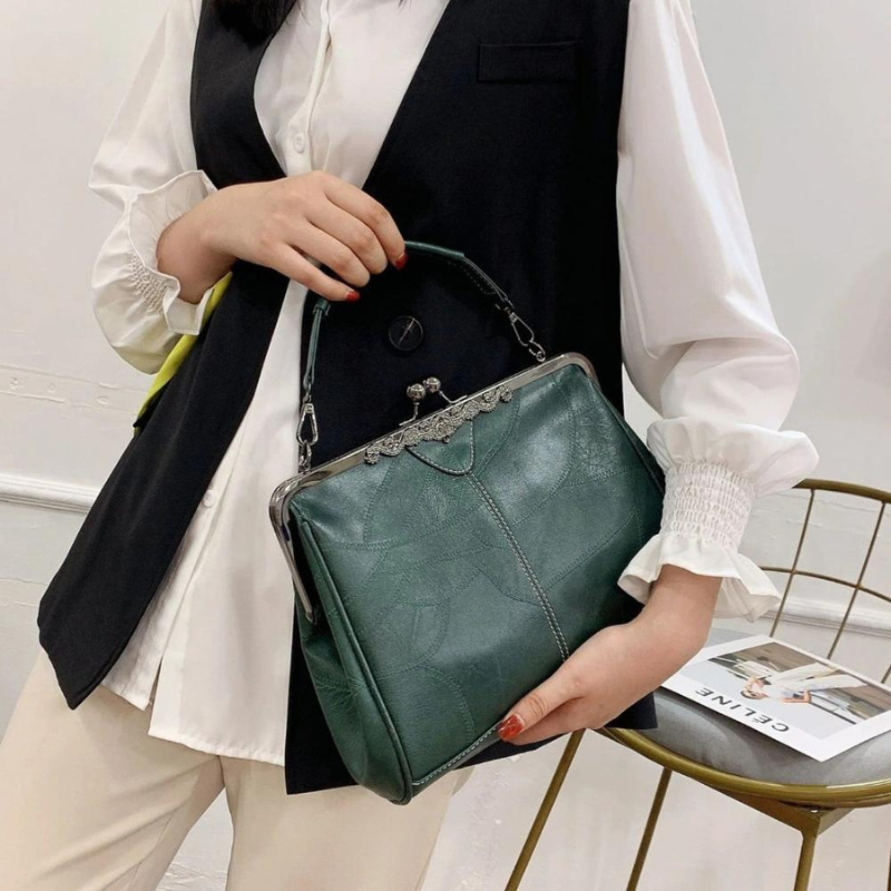 Leather Handbag with Kiss Lock Closure and Clip Handle