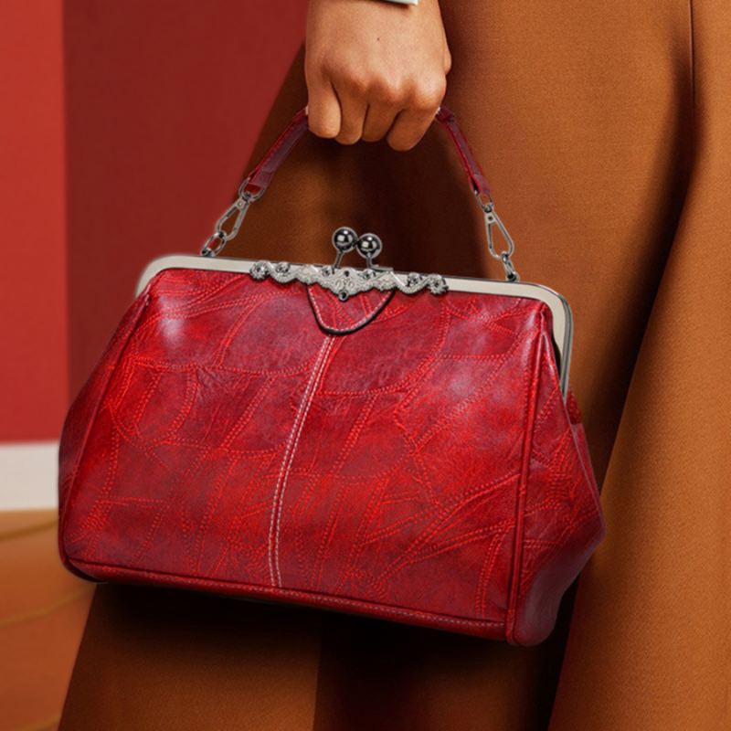 Leather Handbag with Kiss Lock Closure and Clip Handle