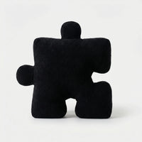 Puzzle-Shaped Cushion in Modern Black and White Design