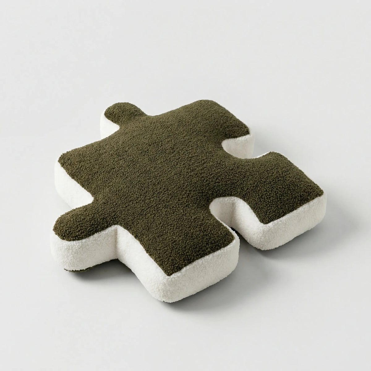 Puzzle-Shaped Cushion in Modern Black and White Design