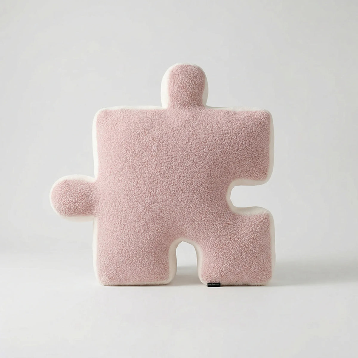 Puzzle-Shaped Cushion in Modern Black and White Design