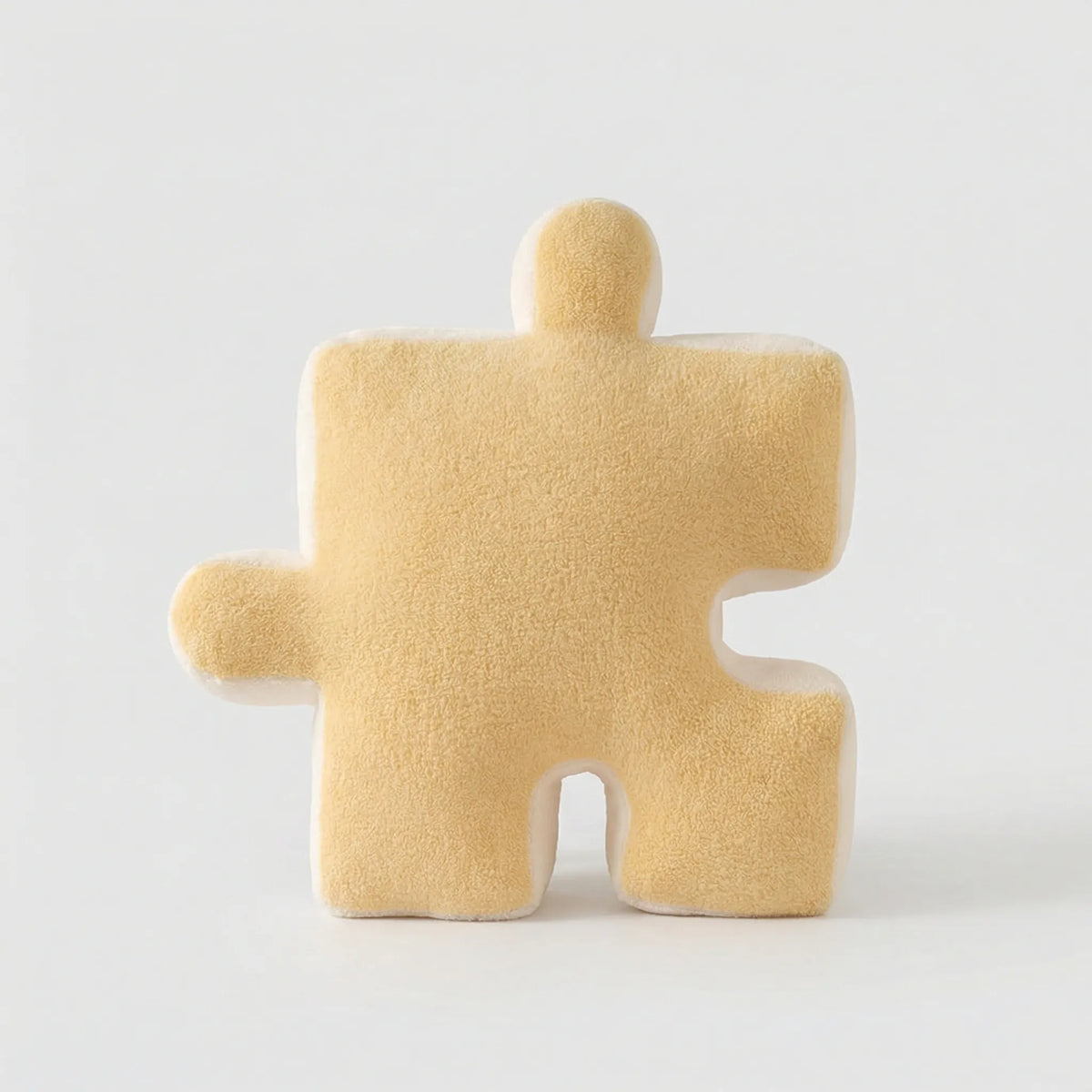 Puzzle-Shaped Cushion in Modern Black and White Design